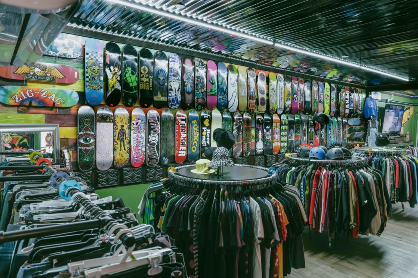 Inside Broke Sk8 with decks and complete skateboards on display